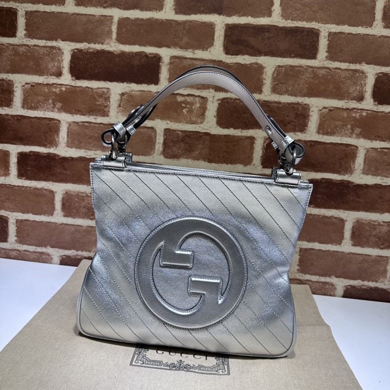 G*u*i top handle bags